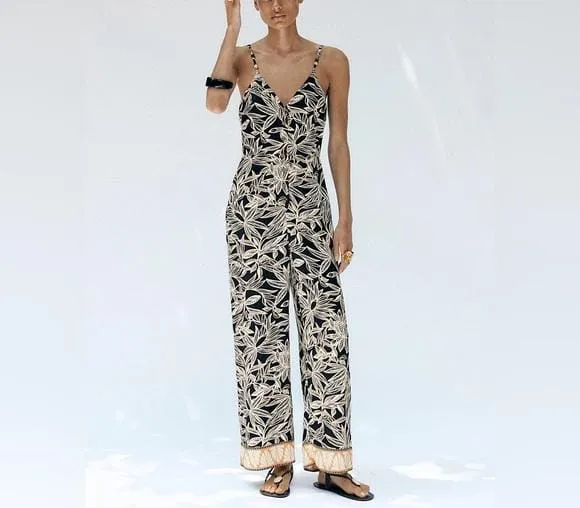 Floral strap flare leg jumpsuit
