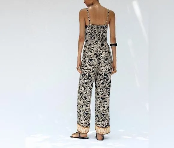 Floral strap flare leg jumpsuit
